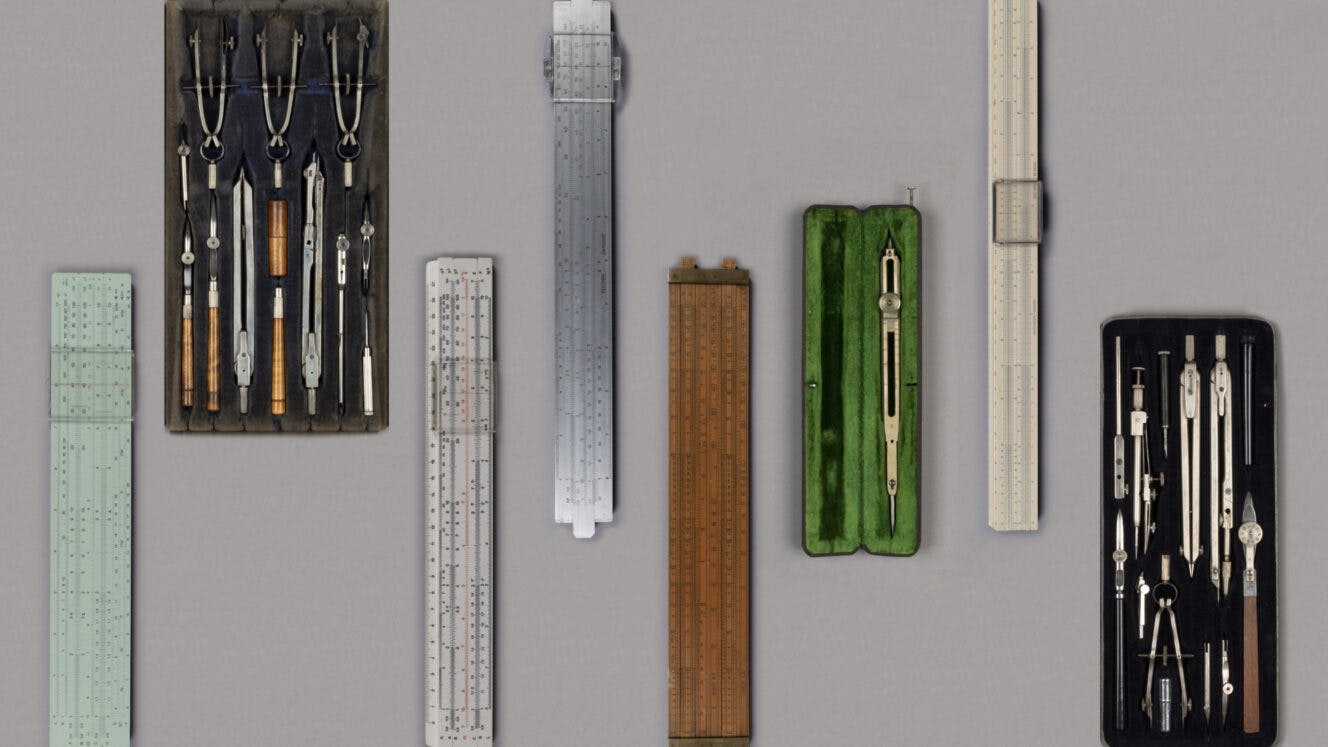 several slide rules and drafting instrument sets from the Rose collection