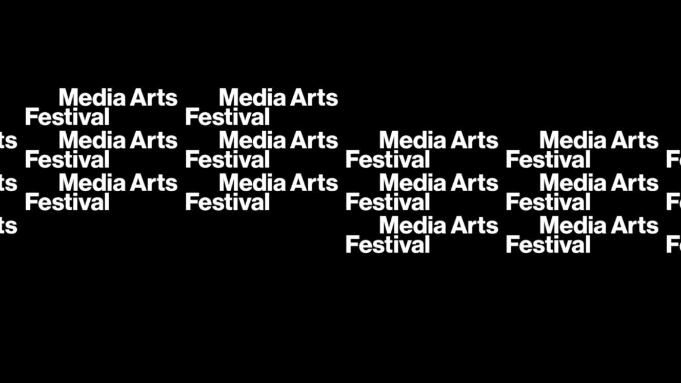 White text against a black background that reads "media arts festival." The text repeats over and over again, forming a pattern.
